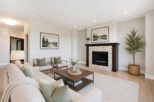 49 Cimarron Springs Circle, Okotoks, AB - Indoor Photo Showing Living Room With Fireplace