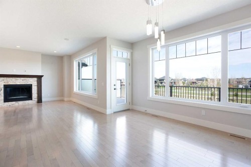 49 Cimarron Springs Circle, Okotoks, AB - Indoor Photo Showing Living Room With Fireplace