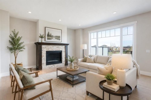 49 Cimarron Springs Circle, Okotoks, AB - Indoor Photo Showing Living Room With Fireplace