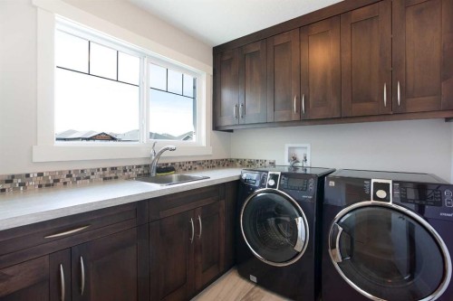 49 Cimarron Springs Circle, Okotoks, AB - Indoor Photo Showing Laundry Room