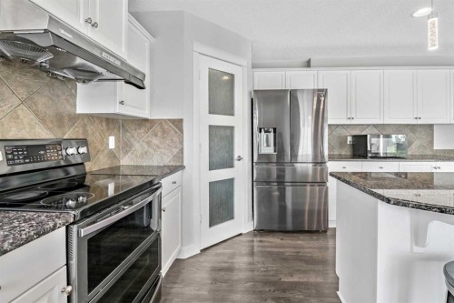 123 Cranwell Close Se, Calgary, AB - Indoor Photo Showing Kitchen With Upgraded Kitchen