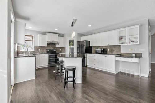 123 Cranwell Close Se, Calgary, AB - Indoor Photo Showing Kitchen With Upgraded Kitchen