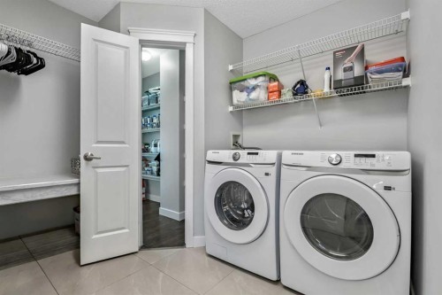 123 Cranwell Close Se, Calgary, AB - Indoor Photo Showing Laundry Room