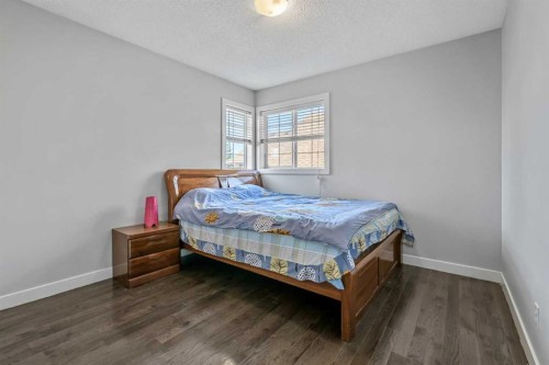123 Cranwell Close Se, Calgary, AB - Indoor Photo Showing Bedroom