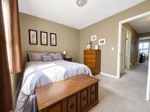 122 Bridlewood Lane Sw, Calgary, AB - Indoor Photo Showing Bedroom