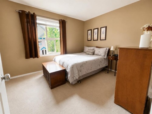 122 Bridlewood Lane Sw, Calgary, AB - Indoor Photo Showing Bedroom