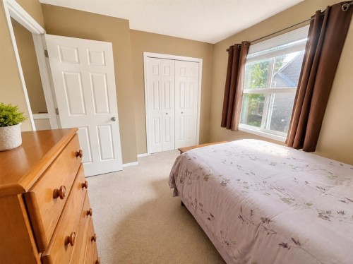 122 Bridlewood Lane Sw, Calgary, AB - Indoor Photo Showing Bedroom