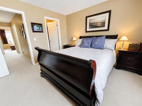 122 Bridlewood Lane Sw, Calgary, AB - Indoor Photo Showing Bedroom