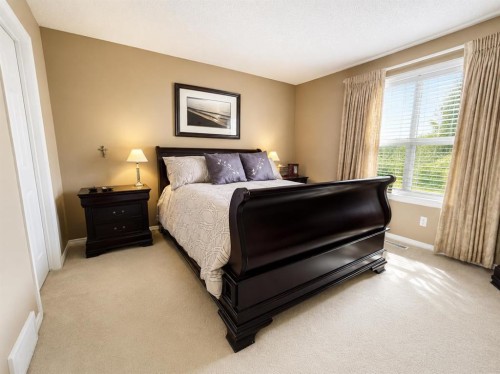 122 Bridlewood Lane Sw, Calgary, AB - Indoor Photo Showing Bedroom