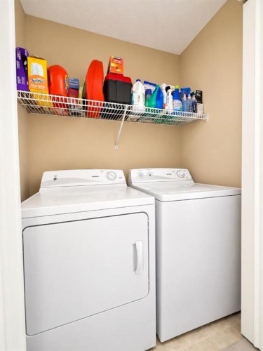 122 Bridlewood Lane Sw, Calgary, AB - Indoor Photo Showing Laundry Room