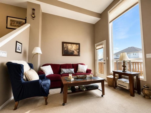 122 Bridlewood Lane Sw, Calgary, AB - Indoor Photo Showing Living Room