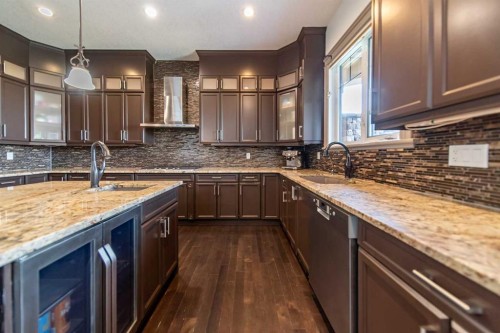 1109 Coopers Drive Sw, Airdrie, AB - Indoor Photo Showing Kitchen With Upgraded Kitchen