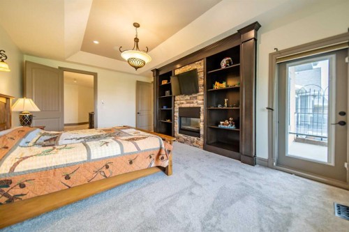 1109 Coopers Drive Sw, Airdrie, AB - Indoor Photo Showing Bedroom