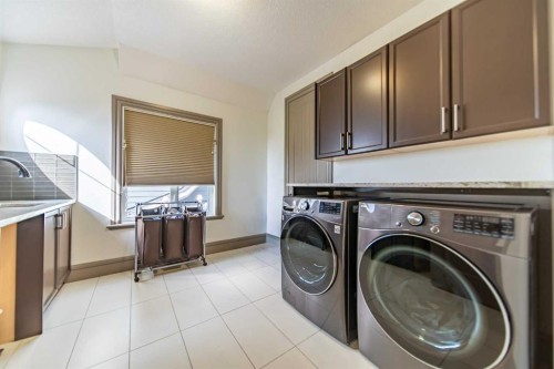 1109 Coopers Drive Sw, Airdrie, AB - Indoor Photo Showing Laundry Room