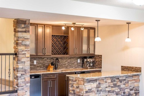 1109 Coopers Drive Sw, Airdrie, AB - Indoor Photo Showing Kitchen