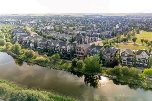 1109 Coopers Drive Sw, Airdrie, AB - Outdoor With Body Of Water With View
