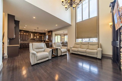 1109 Coopers Drive Sw, Airdrie, AB - Indoor Photo Showing Living Room
