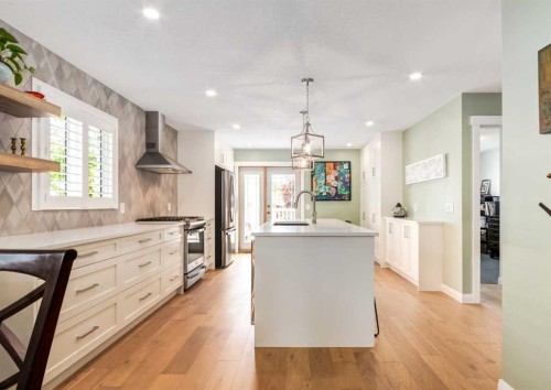 6 Vandoos Villas Nw, Calgary, AB - Indoor Photo Showing Kitchen With Upgraded Kitchen