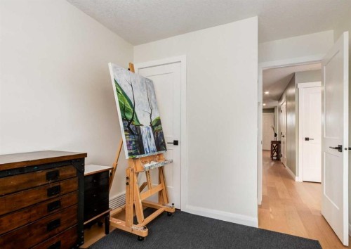 6 Vandoos Villas Nw, Calgary, AB - Indoor Photo Showing Other Room