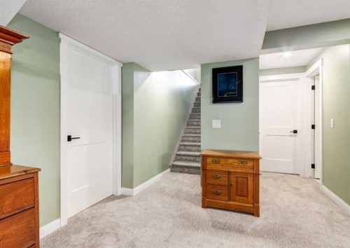 6 Vandoos Villas Nw, Calgary, AB - Indoor Photo Showing Other Room