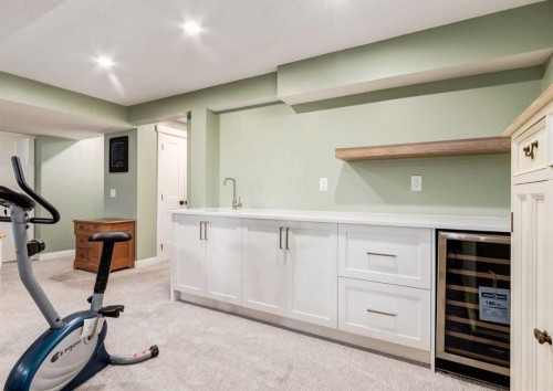 6 Vandoos Villas Nw, Calgary, AB - Indoor Photo Showing Gym Room