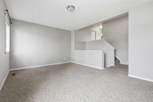 129 Hidden Spring Circle Nw, Calgary, AB - Indoor Photo Showing Other Room