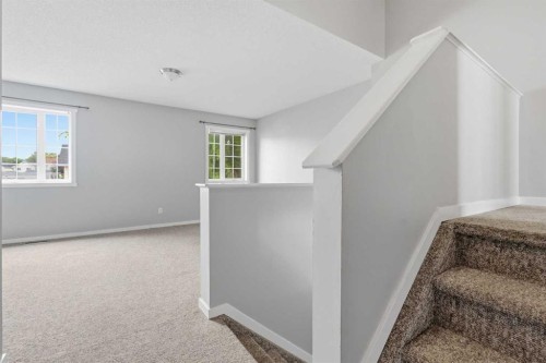 129 Hidden Spring Circle Nw, Calgary, AB - Indoor Photo Showing Other Room