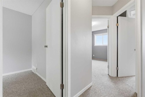 129 Hidden Spring Circle Nw, Calgary, AB - Indoor Photo Showing Other Room