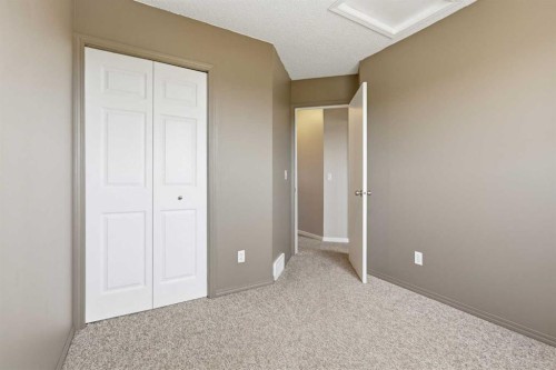 129 Hidden Spring Circle Nw, Calgary, AB - Indoor Photo Showing Other Room