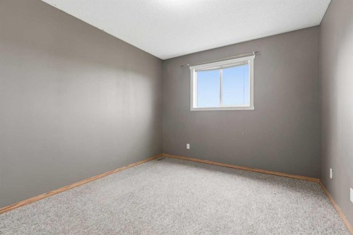 129 Hidden Spring Circle Nw, Calgary, AB - Indoor Photo Showing Other Room