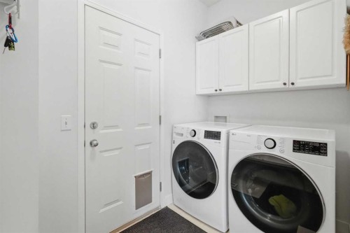 173 Tuscany Ridge View Nw, Calgary, AB - Indoor Photo Showing Laundry Room