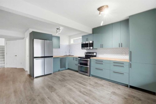173 Tuscany Ridge View Nw, Calgary, AB - Indoor Photo Showing Kitchen With Stainless Steel Kitchen