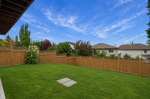 173 Tuscany Ridge View Nw, Calgary, AB - Outdoor With Backyard