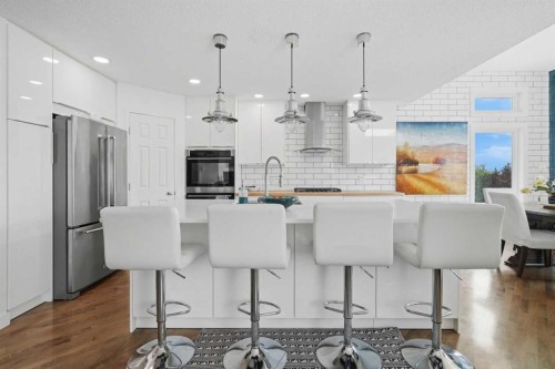 173 Tuscany Ridge View Nw, Calgary, AB - Indoor Photo Showing Kitchen With Stainless Steel Kitchen With Upgraded Kitchen