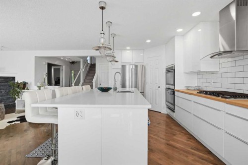 173 Tuscany Ridge View Nw, Calgary, AB - Indoor Photo Showing Kitchen With Upgraded Kitchen