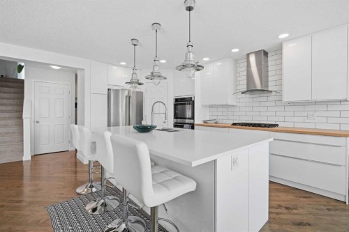 173 Tuscany Ridge View Nw, Calgary, AB - Indoor Photo Showing Kitchen With Upgraded Kitchen