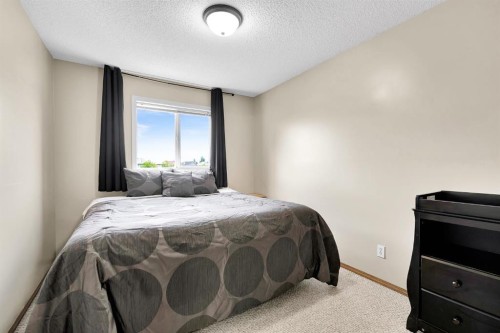 238 Covepark Way Ne, Calgary, AB - Indoor Photo Showing Bedroom