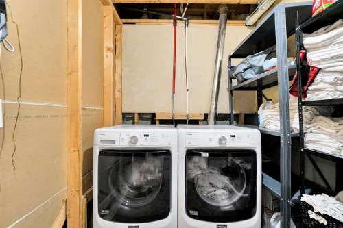 238 Covepark Way Ne, Calgary, AB - Indoor Photo Showing Laundry Room