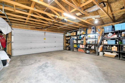238 Covepark Way Ne, Calgary, AB - Indoor Photo Showing Garage
