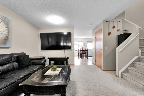 238 Covepark Way Ne, Calgary, AB - Indoor Photo Showing Living Room