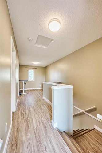 193 Patina Park Sw, Calgary, AB - Indoor Photo Showing Other Room