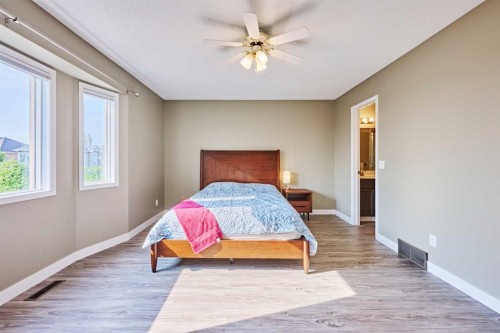 193 Patina Park Sw, Calgary, AB - Indoor Photo Showing Bedroom