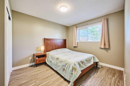 193 Patina Park Sw, Calgary, AB - Indoor Photo Showing Bedroom