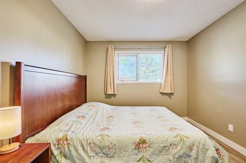 193 Patina Park Sw, Calgary, AB - Indoor Photo Showing Bedroom