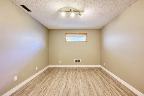 193 Patina Park Sw, Calgary, AB - Indoor Photo Showing Other Room