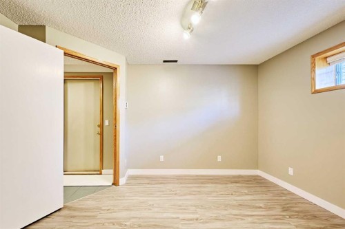 193 Patina Park Sw, Calgary, AB - Indoor Photo Showing Other Room