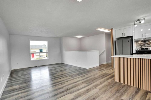 55 Falton Close Ne, Calgary, AB - Indoor Photo Showing Other Room