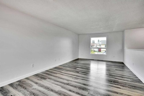 55 Falton Close Ne, Calgary, AB - Indoor Photo Showing Other Room