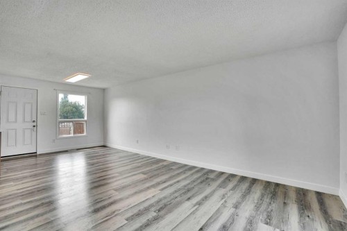 55 Falton Close Ne, Calgary, AB - Indoor Photo Showing Other Room