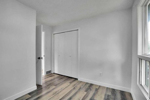 55 Falton Close Ne, Calgary, AB - Indoor Photo Showing Other Room